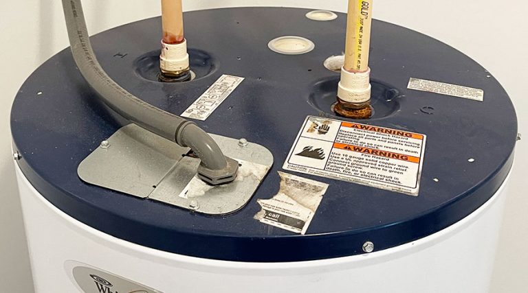 Why Water Heater Leaking From Top & How to Fix It