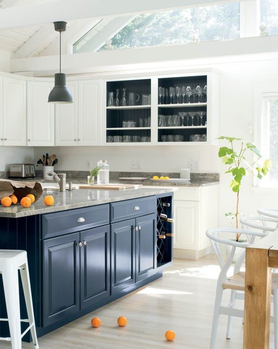 Benjamin Moore Oxford Gray dark blue gray paint colors for cabinets in a kitchen pictured here with contrasting white cabinets